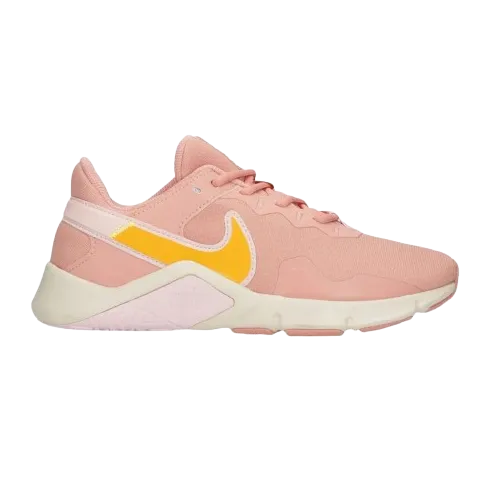 Nike Women's Legend Essential 2 Shoes - Light Pink / Gold